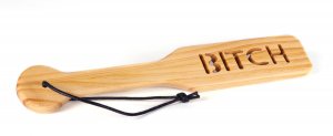 WOOD PADDLE WITH WORD "BITCH" IMPRINT