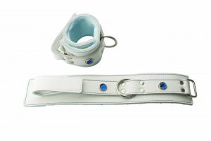 White leather restraints with baby blue lining